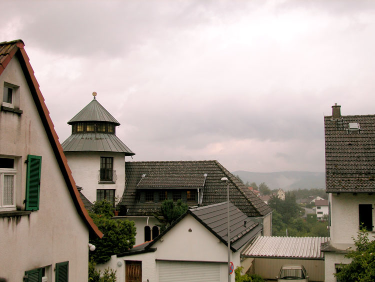 Looking past houses to valley below