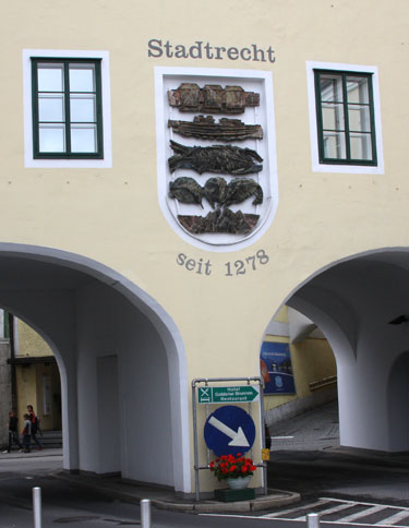 coat of arms and date